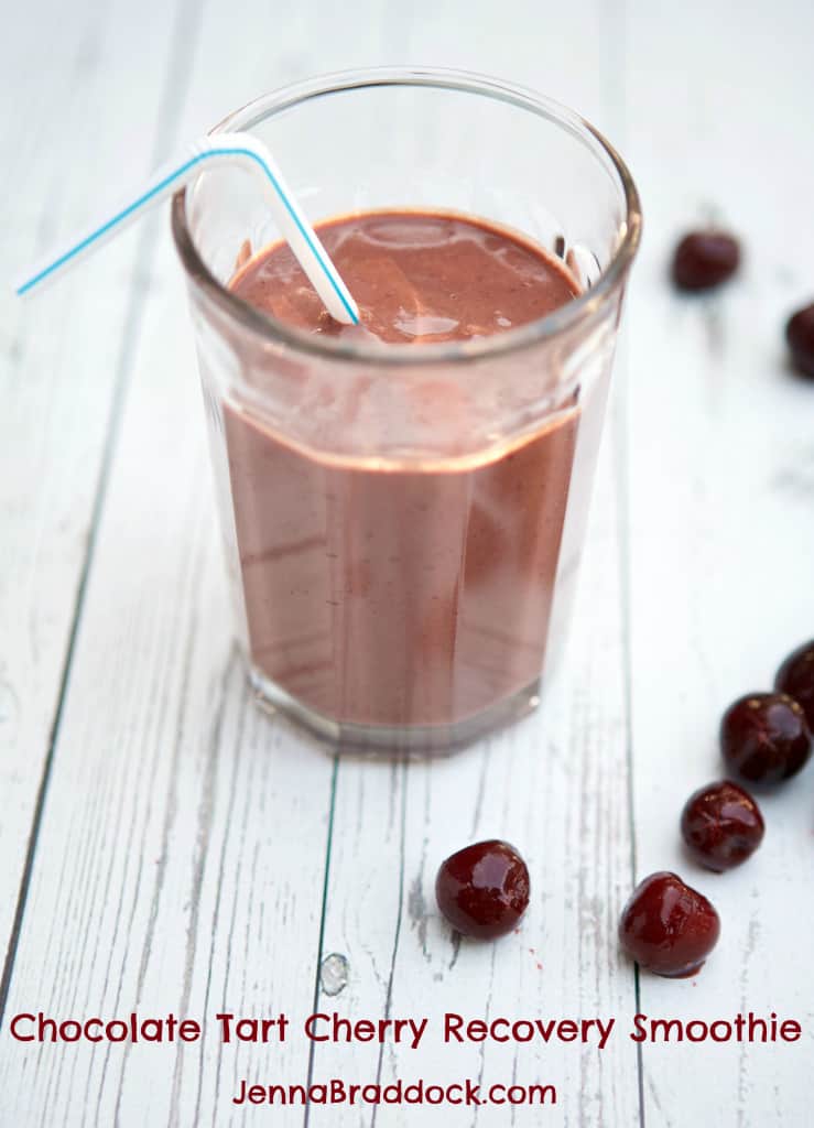 chocolate tart cherry recover smoothie in a glass with a straw