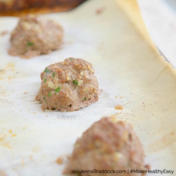 Making mouth-watering, homemade meatballs is NOT a daunting task with this quick, 6 ingredient recipe and simple ingredient list. Just a few fresh add-ins turn a boring meal idea into something amazing! Add these to marinara, put on a sub, pair with roasted veggies or serve as is as an appetizer. #MakeHealthyEasy | www.JennaBraddock.com #recipe #Italian #simplesupper #beef