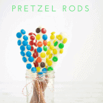 These White Chocolate Dipped Pretzel Rods are so easy that you will never need to buy a sweet treat for a party or special gift again. Serve them open in a mason jar or individually wrapped for a reasonable, beautiful dessert. #MakeHealthyEasy via @JBraddockRD http://JennaBraddock.com