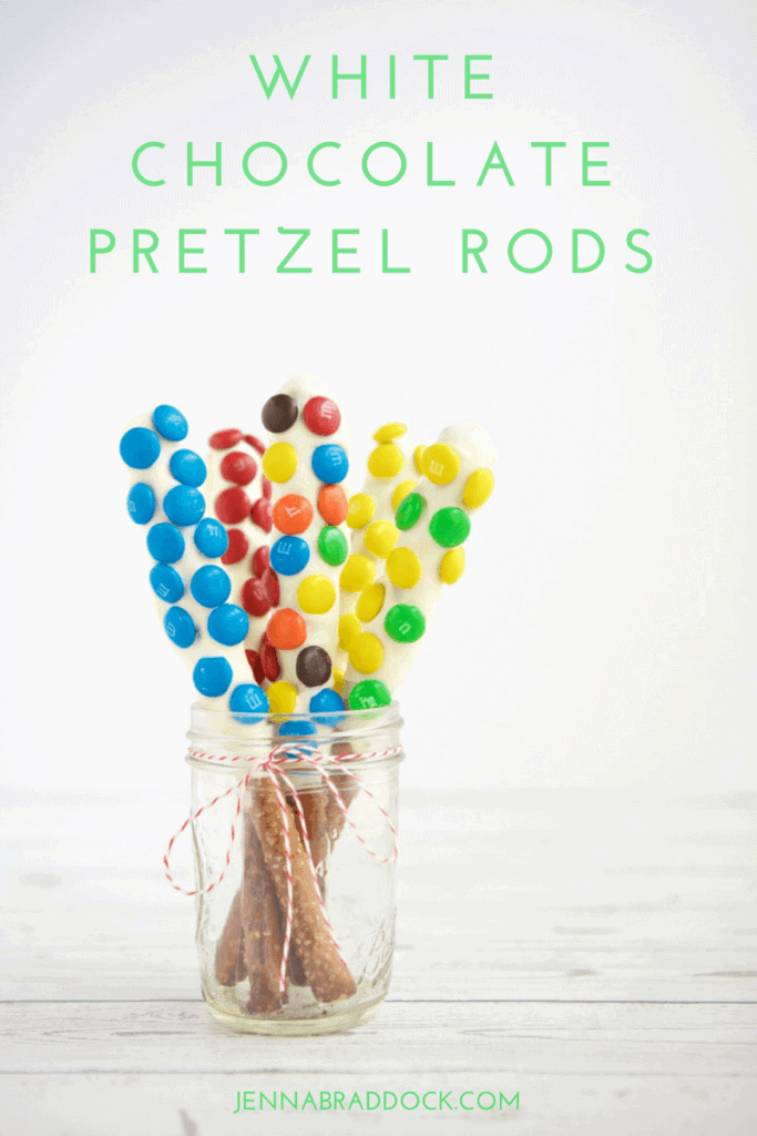 These White Chocolate Dipped Pretzel Rods are so easy that you will never need to buy a sweet treat for a party or special gift again. Serve them open in a mason jar or individually wrapped for a reasonable, beautiful dessert. #MakeHealthyEasy via @JBraddockRD http://JennaBraddock.com