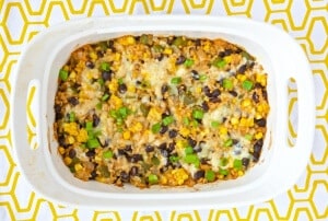 This Vegetarian Rice & Bean Casserole is an easy and healthy solution for getting dinner on the table. It can be made ahead and frozen so it's extremely quick to throw together. #MakeHealthyEasy via @JBraddockRD http://JennaBraddock.com
