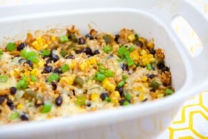 This Vegetarian Rice & Bean Casserole is an easy and healthy solution for getting dinner on the table. It can be made ahead and frozen so it's extremely quick to throw together. #MakeHealthyEasy via @JBraddockRD http://JennaBraddock.com