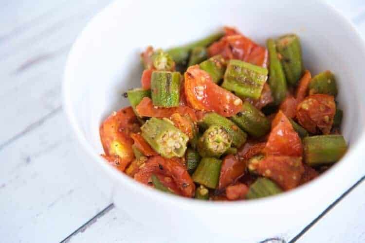 bowl of roasted okra and tomatoes as a healthy side dish