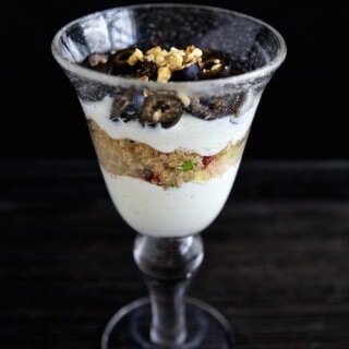 Savory Mediterranean Yogurt Parfait - A unique twist on a yogurt parfait, perfect for an easy lunch. Olives, cucumber, parsley, sun dried tomatoes and garlic bring together the flavors of the Mediterranean in this healthy and delicious dish. #MakeHealthyEasy via @JBraddockRD http://JennaBraddock.com