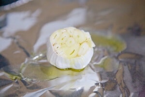How to "roast" garlic in the slow cooker. #MakeHealthyEasy via @JBraddockRD http://JennaBraddock.com