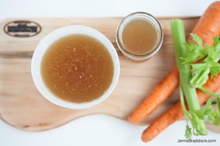 Slow Cooker Turkey Stock is the easiest and most delicious way to make your own turkey or chicken stock. Simply throw the bones from your roast turkey (or chicken) into the slow cooker, cover with water, and add some goodies and let it cook for 24 hours! #MakeHealthyEasy 