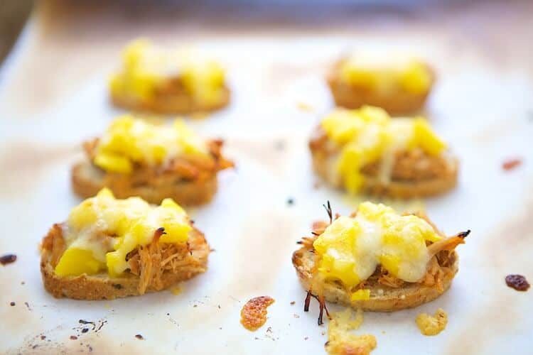 This Mango Cheddar Pork Crostini is an easy, delicious appetizer that's on the lighter side. But don't worry, no one will notice because they taste so good.