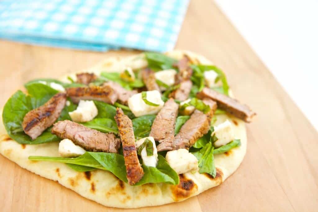 Steak meets salad meets pizza in this easy and healthy recipe for Grilled Steak and Mozzarella Flatbread.