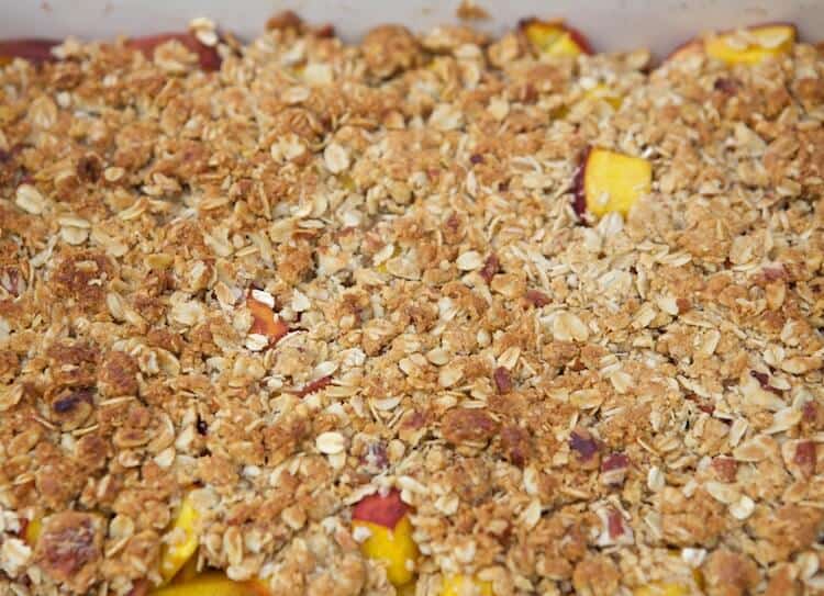 This Easy Peach Crisp recipe is perfect for a lighter summer dessert. You can customize this recipe to meet your vegan, gluten or flavor preferences.