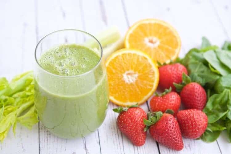 In my humble opinion, a good smoothie recipe is one of the BEST ways to quickly, easily and usually deliciously to add more fruits and vegetables to your life. This Strawberry Orange Green Smoothie recipe is one of my go-to recipes for my daily smoothie.