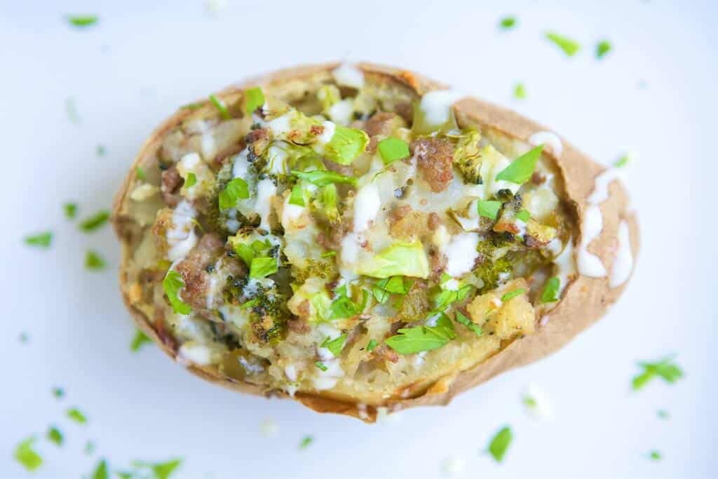 These bison, blue cheese, and veggie stuffed twice baked potatoes bring bold flavors and healthy eating together in an all-in-one meal. If you've not eaten bison before, this is a great recipe to start with.