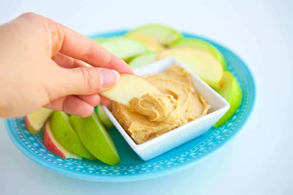 This simple 3 ingredient Peanut Butter Frosting Dip is so good you won't believe it's healthy. It's perfect for dipping all kinds of fruit and other "dippers."
