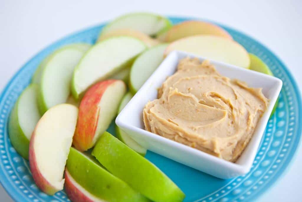 This simple 3 ingredient Peanut Butter Frosting Dip is so good you won't believe it's healthy. It's perfect for dipping all kinds of fruit and other "dippers."