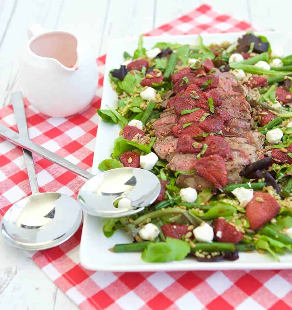 This unique salad pairs bold-flavored steak with the naturally sweet, roasted strawberries to create a surprising combinations. Layering a lean steak on top of a mound of nutrient rich ingredients is a balanced way to enjoy it any day of year.