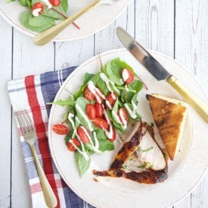 grilled turkey breast, jalapeno cornbread, and salad on a plate