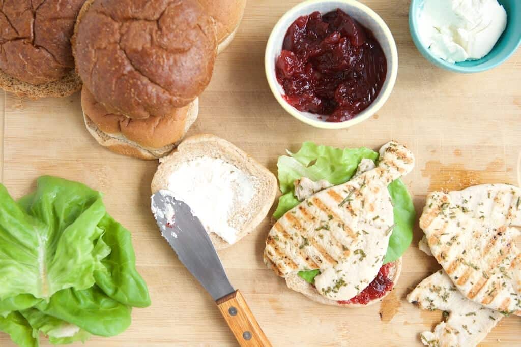 whole grain roll, cranberry sauce, softened goat cheese, butter lettuce, and grilled turkey cutlets.