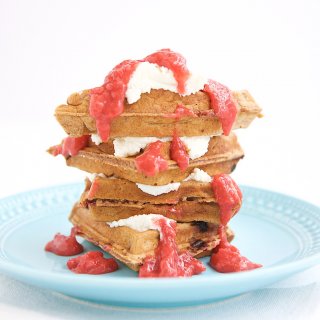 This whole grain strawberry waffle with strawberry sauce is everything you are looking for in a healthier waffle, and more! The simple strawberry sauce is a divine topping, allowing you to forgo syrup and not miss it.