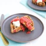 This whole grain strawberry waffle with strawberry sauce is everything you are looking for in a healthier waffle, and more! The simple strawberry sauce is a divine topping, allowing you to forgo syrup and not miss it.