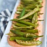 Elevate your appetizer or side dish scene with this sophisticated, yet simple to prepare, Roasted Okra with Smoky Red Pepper Ricotta recipe.