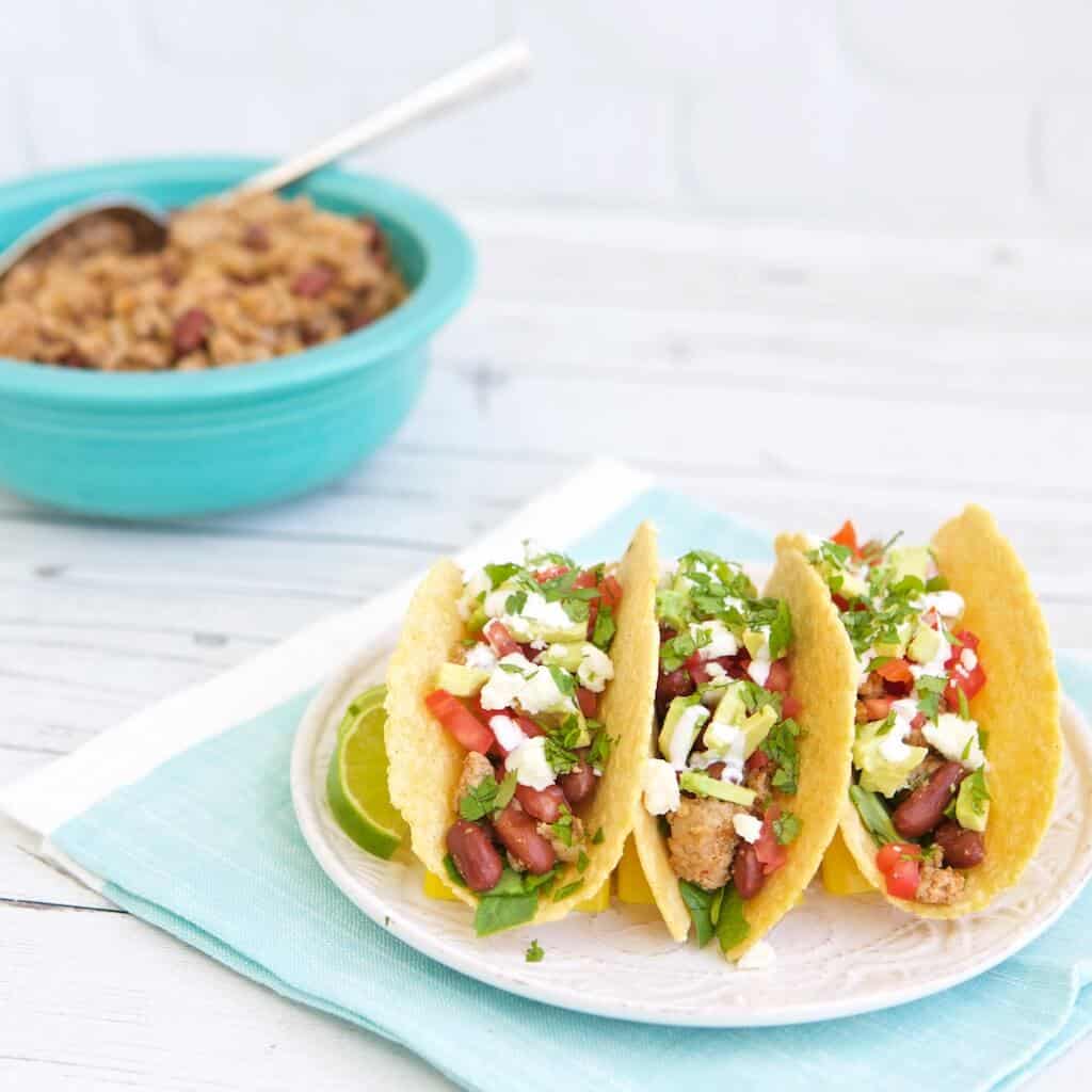 easy taco meat in three taco shells