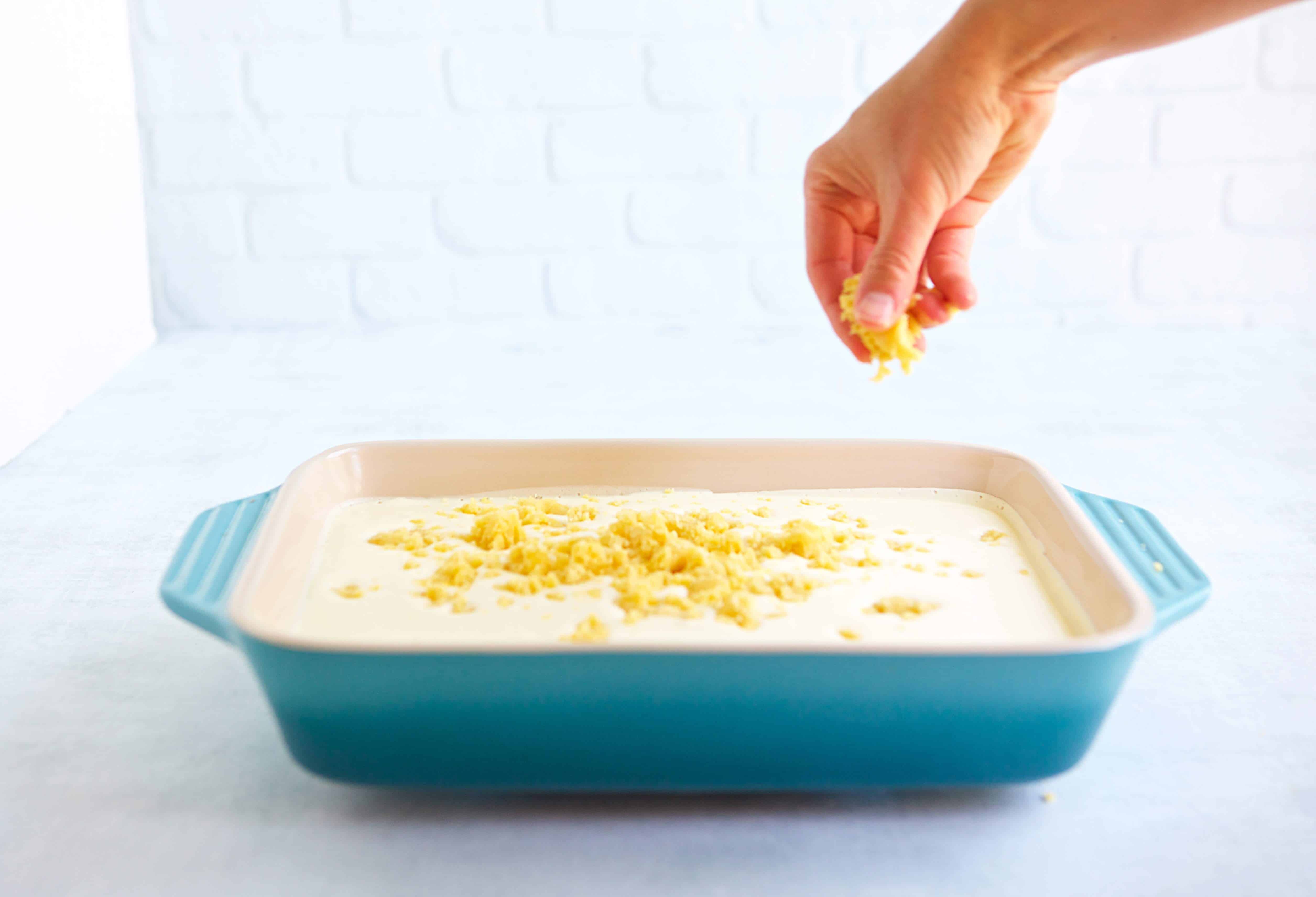 sprinkling the lemon zest over the top of the unbaked bars