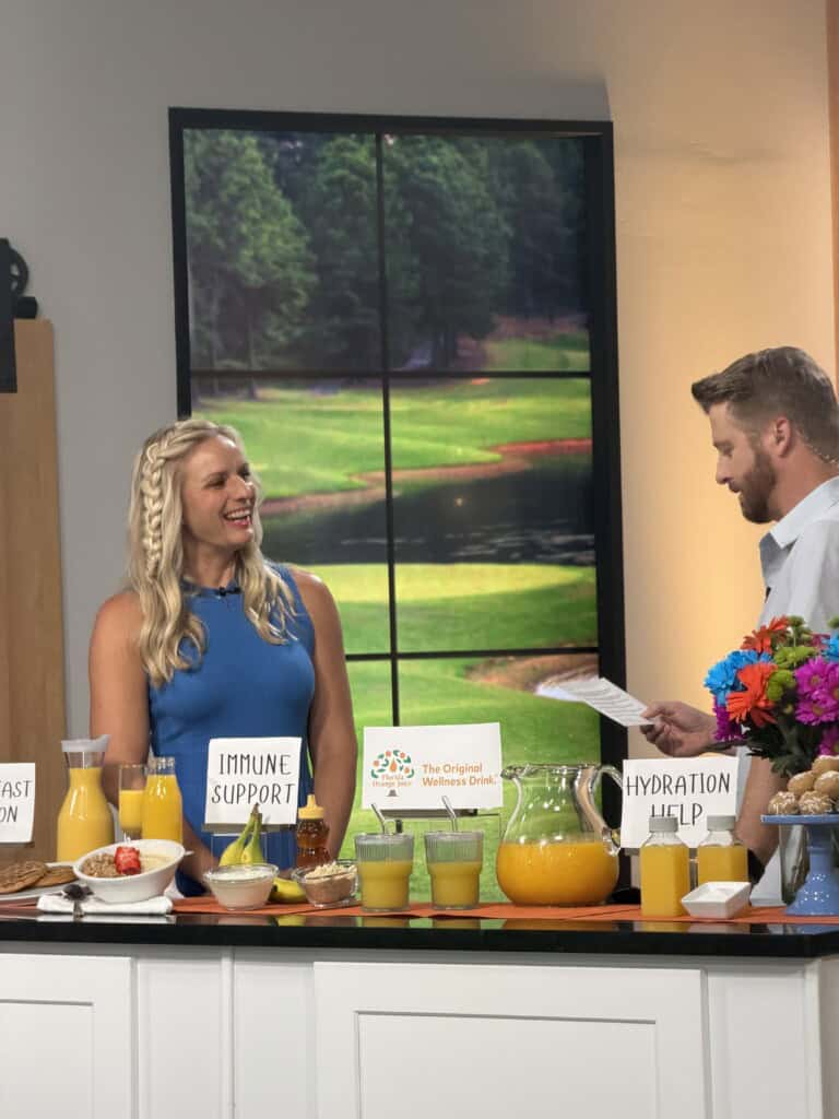 women and man on tv set
