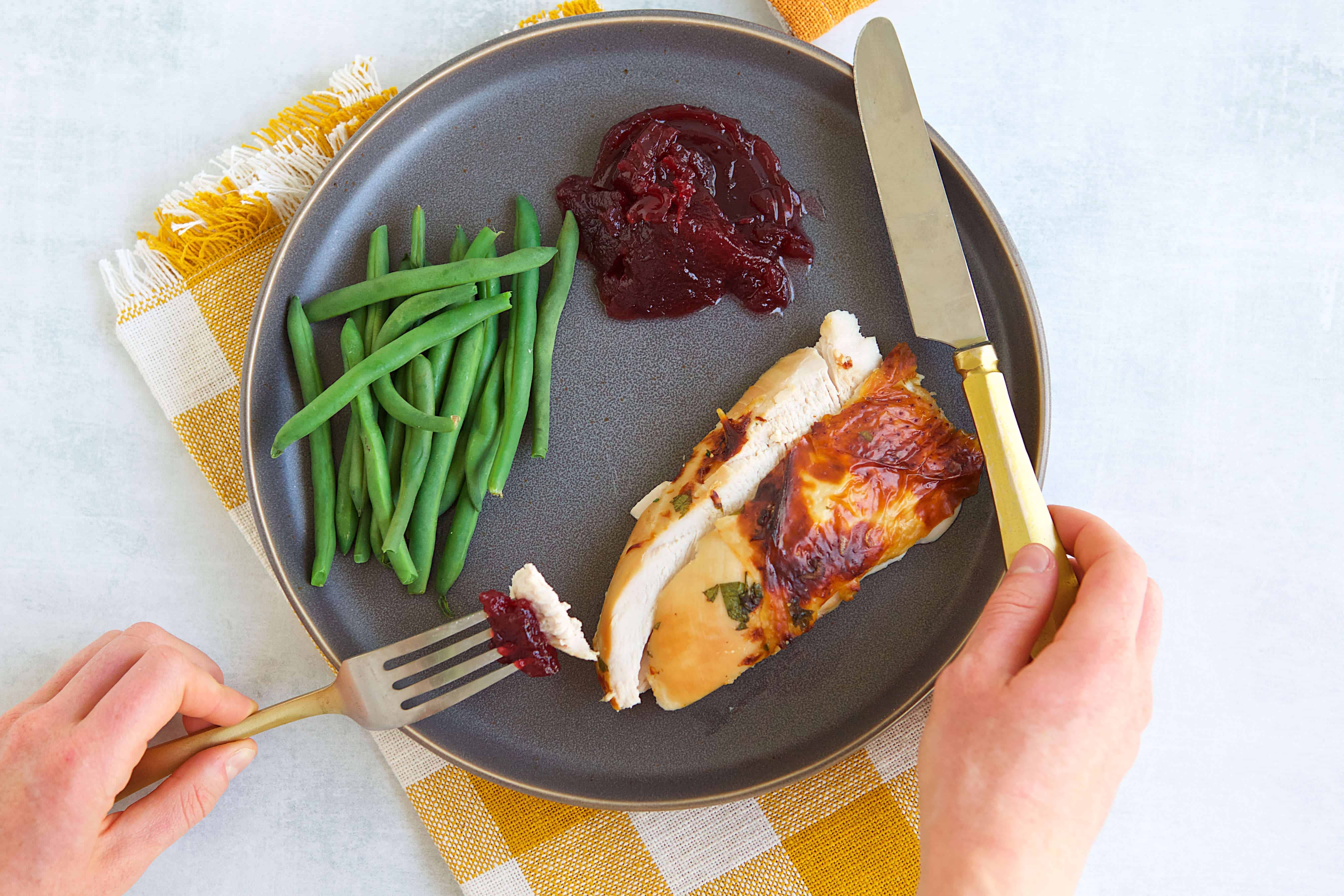 Turkey Breast Brined and served with green beans and cranberry sauce.