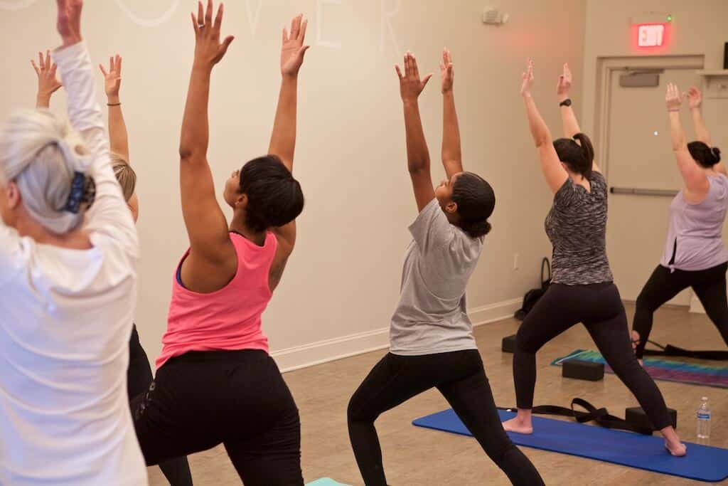 women's wellness - women doing yoga