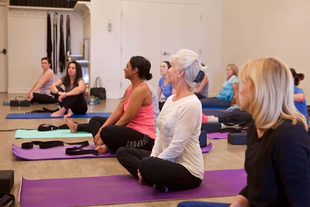 women's wellness - women doing yoga