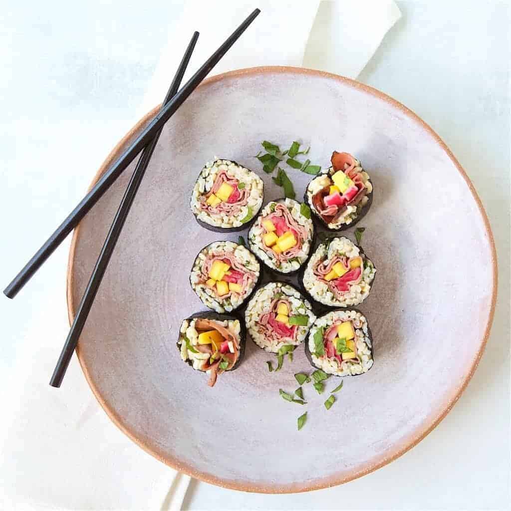 https://jennabraddock.com/wp-content/uploads/2020/05/Mango-Basil-Beefshi-roll-half-5.jpg