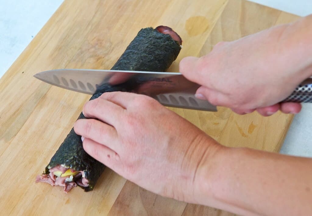 Cutting sushi roll