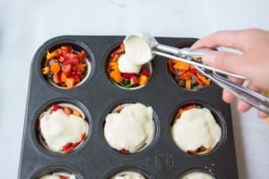 Adding the filling to mini breakfast pies