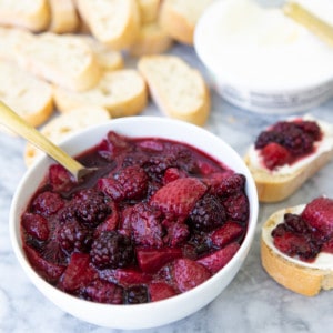 Cabernet berry compote in serving bowl and shown on top of mascarpone toast