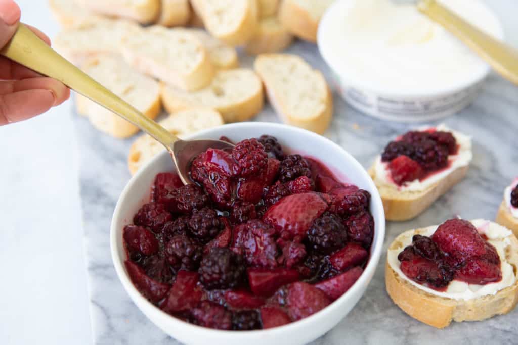 Cabernet berry compote with spoon in it showing texture