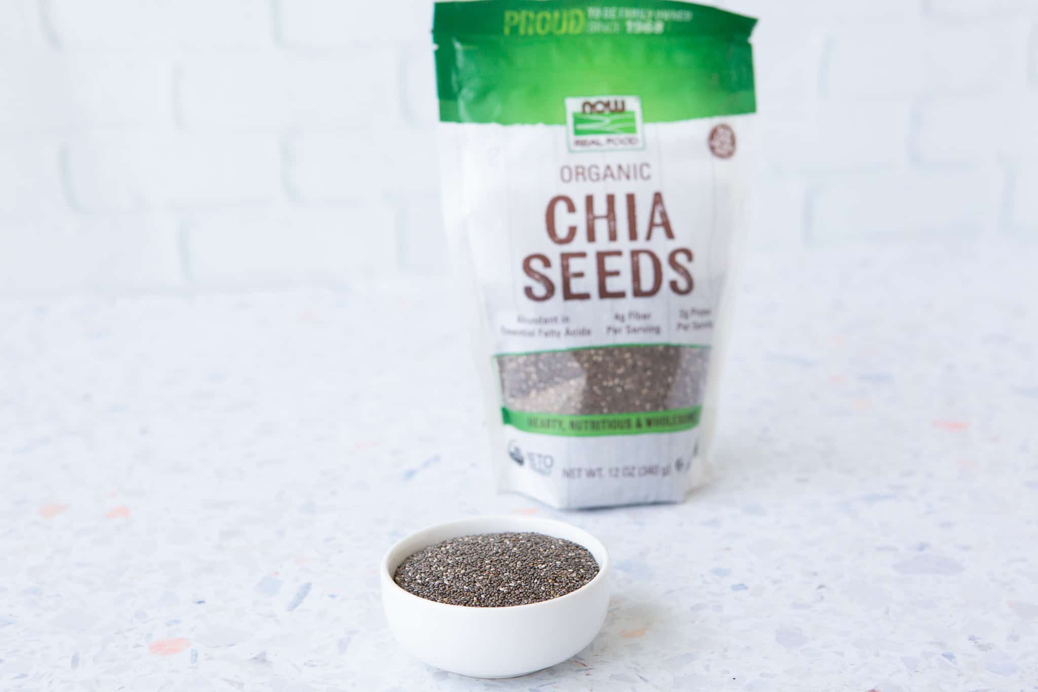 Bag of chia seeds with a bowl of chia seeds