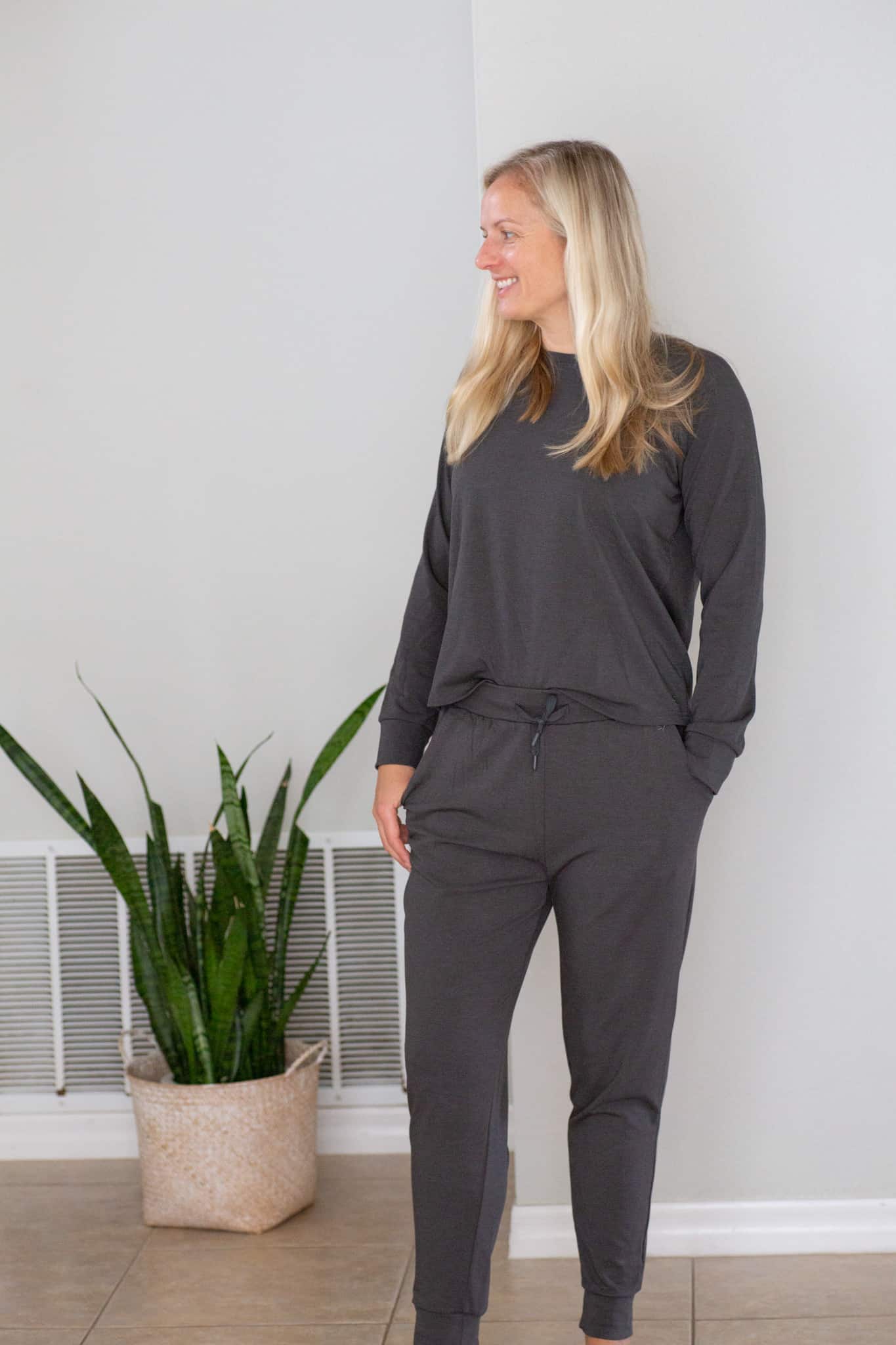 Jenna wearing Cozy Earth lounge wear in grey