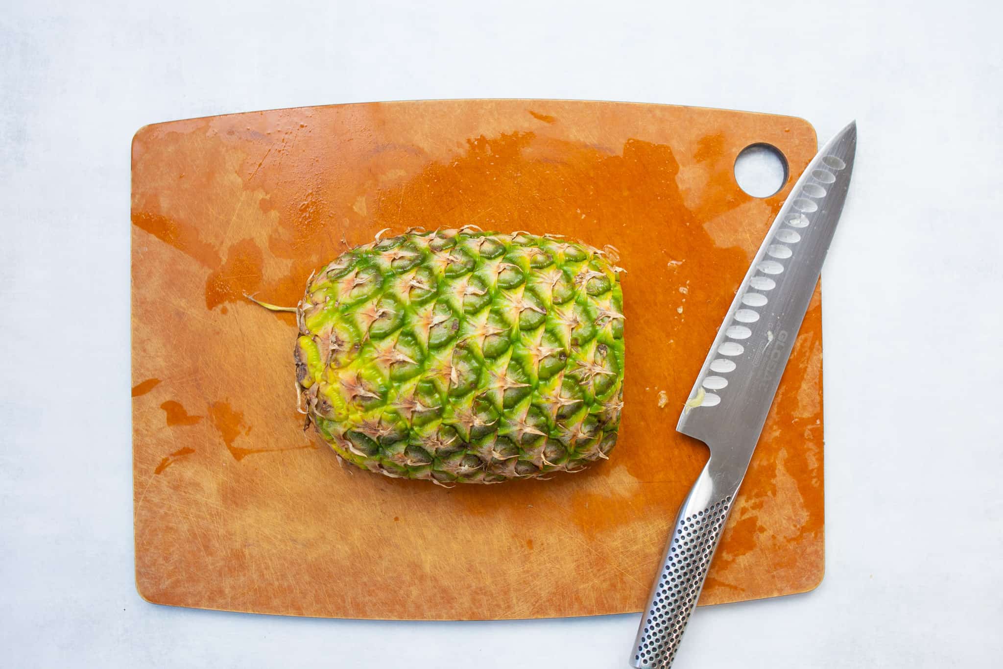 cut pineapple in half