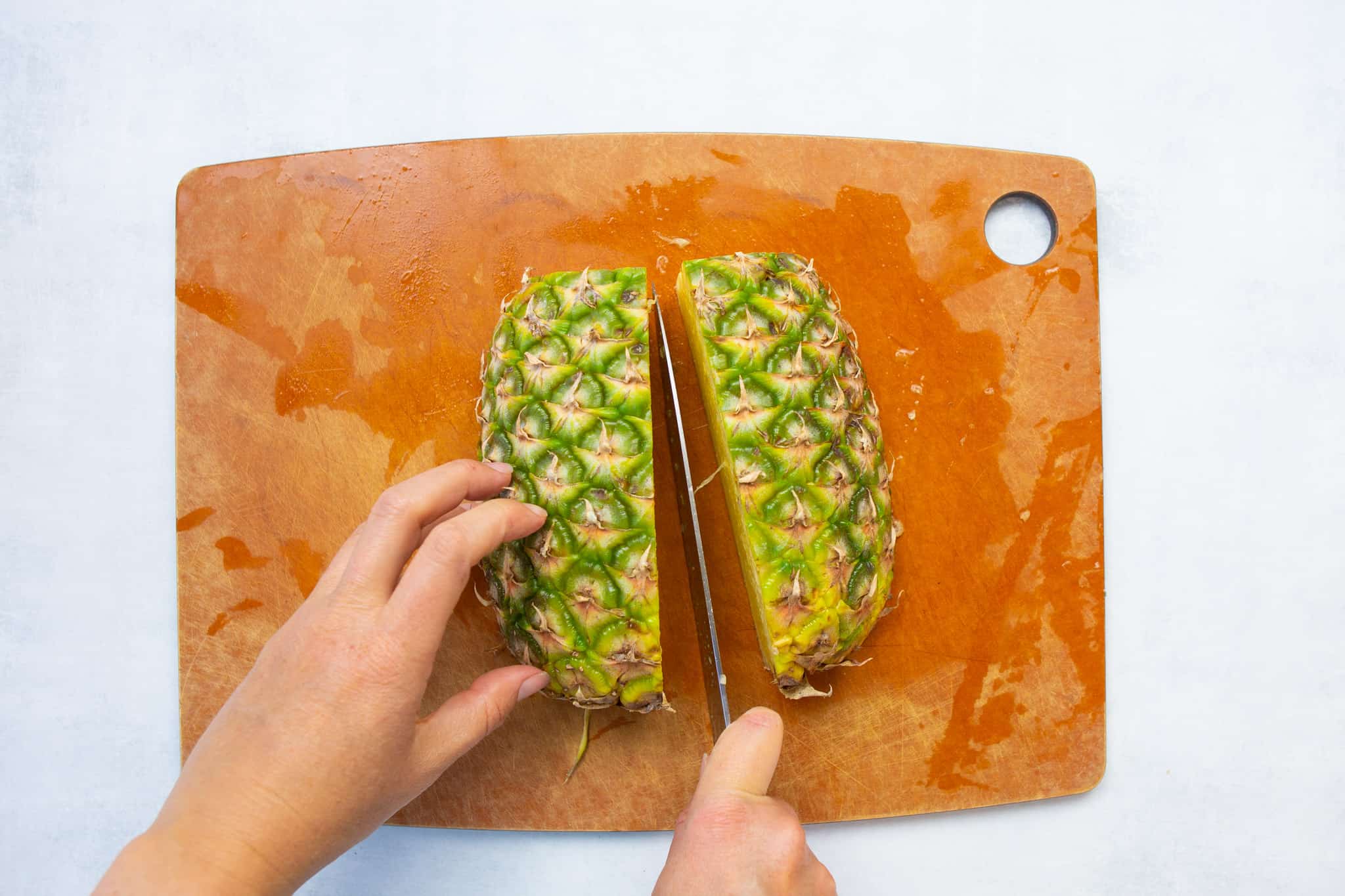 cut pineapple in half