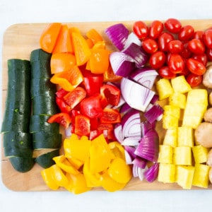 Fruits and veggies cut up and ready to make kabobs