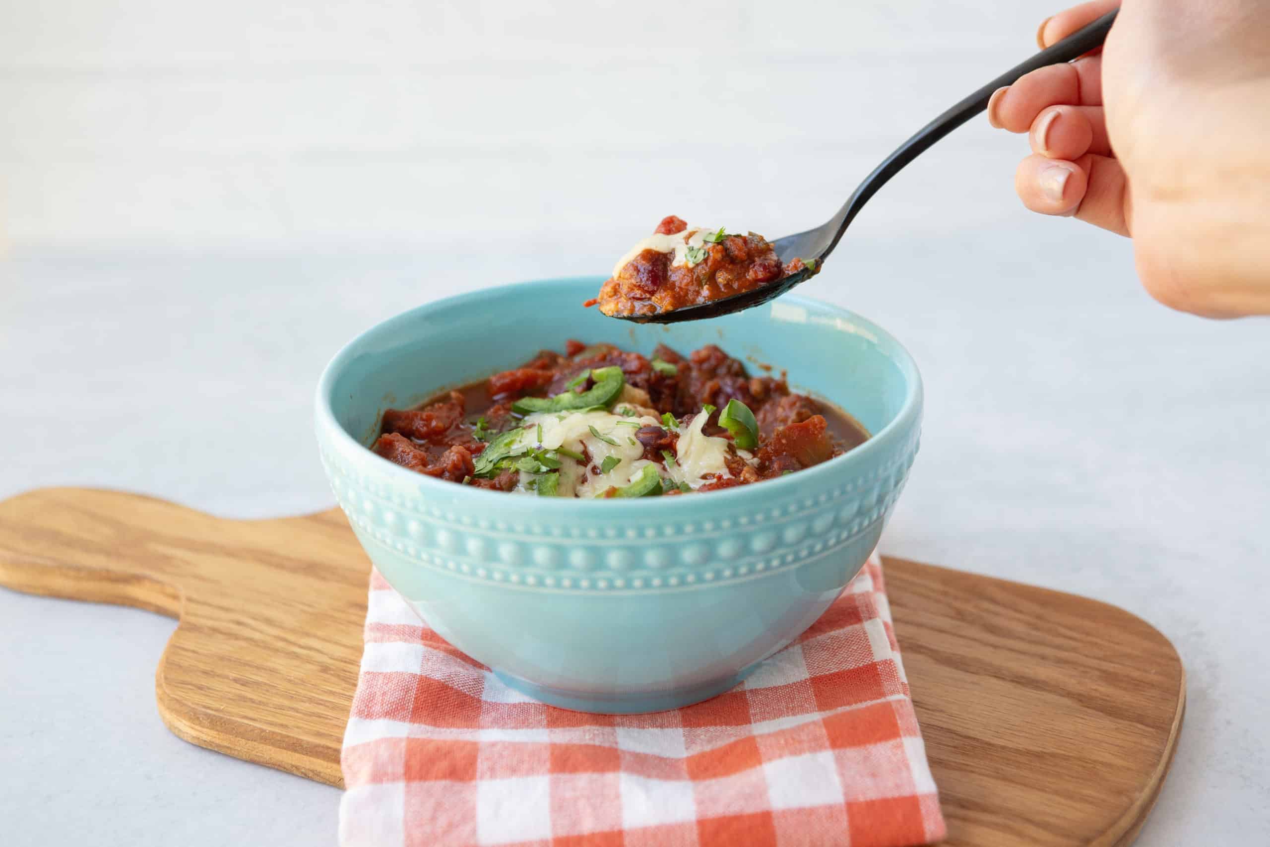 Easy Instant Pot Turkey Chili in a bowl with toppings