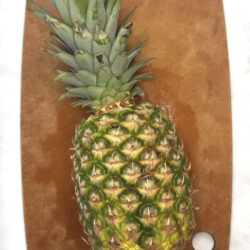 pineapple on a cutting board with no signs of spoilage